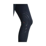 Black knee pad with glossy circles and red accent on hy equestrian childrens selah competition riding tights back side