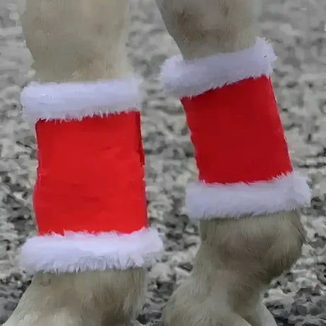 Red santa-themed horse leg wraps with white faux fur trim perfect for equestrian christmas santa look