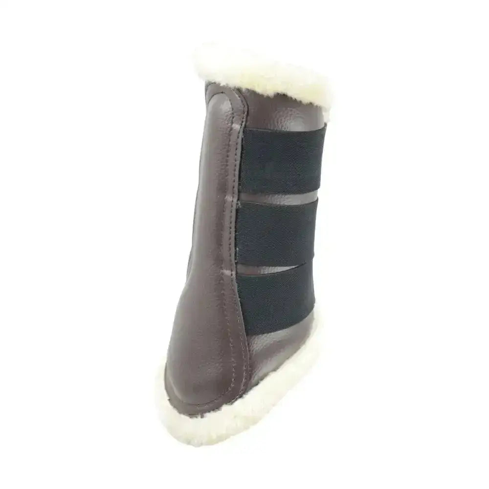Brown leather brushing boots with black elastic straps and white shearling lining for beautifully fitted brushing