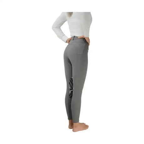 Gray hy equestrian corby cool ladies breeches with black silicone knee patches and subtle hip logo