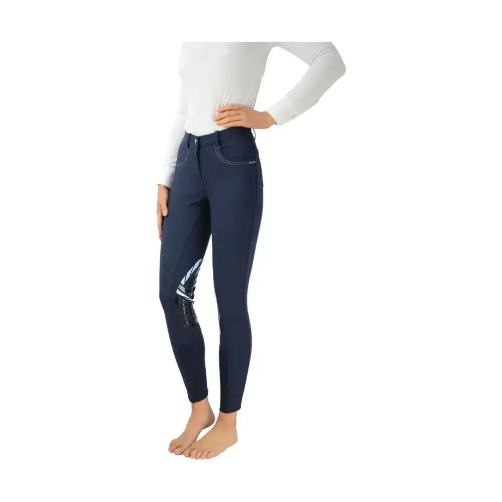 Navy blue equestrian corby cool ladies breeches with white logo, reflective panel on thigh, and silicone knee patches