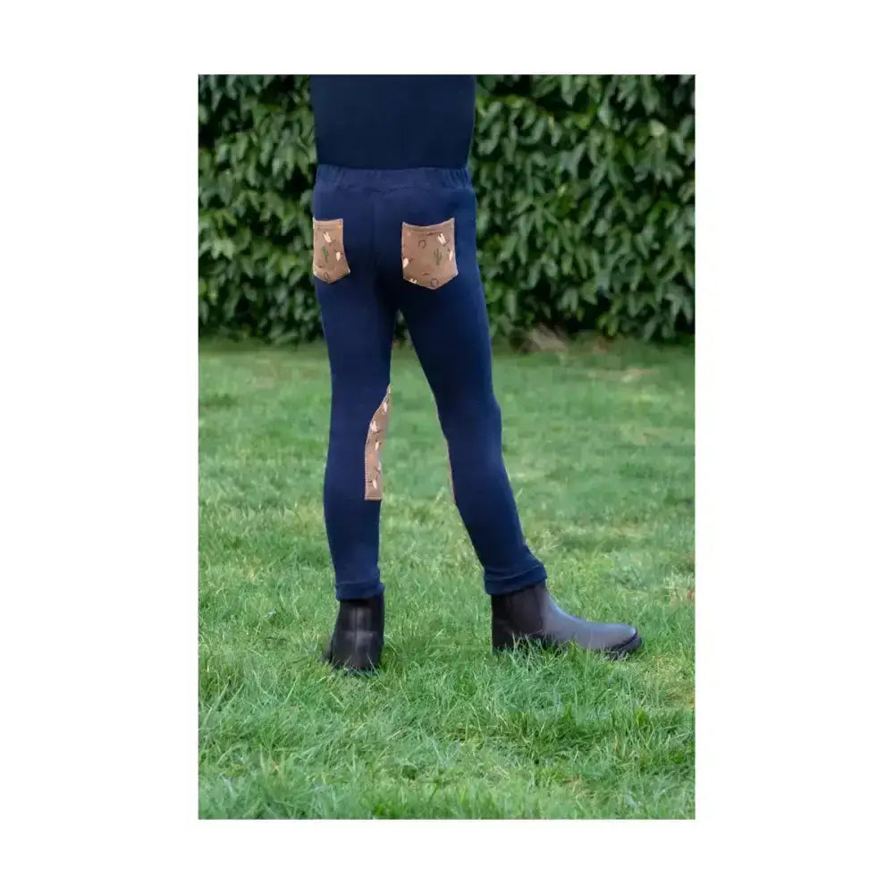 Back view of hy equestrian cowboy tots navy blue jodhpurs with tan leather patches perfect for cowboy’s day