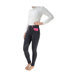 Black equestrian diesel ladies jodhpurs with vibrant pink accents and reinforced knee patches, fashionable and durable pants