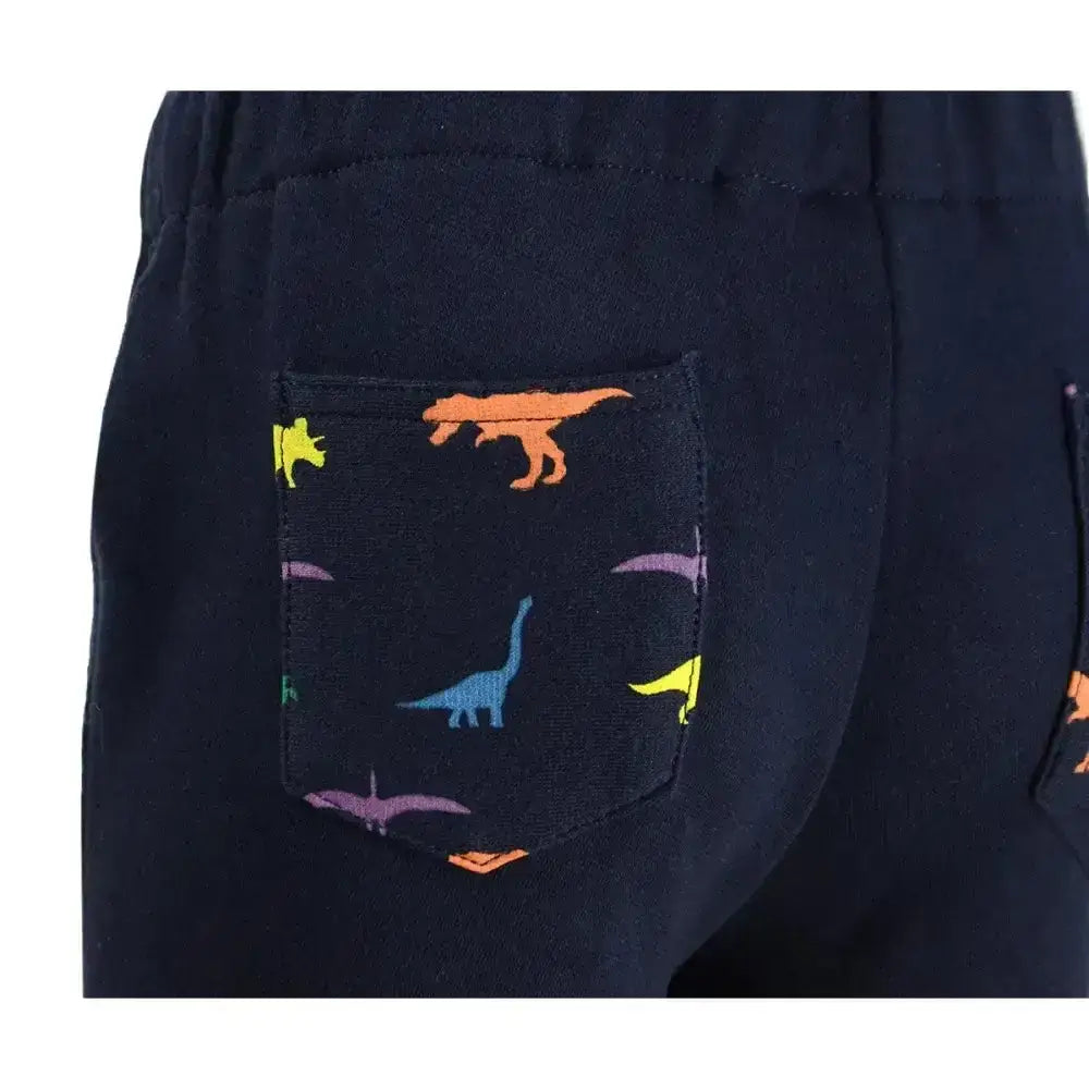 Navy blue equestrian dinosaur tots jodhpurs for kids with a colourful dinosaur print on the front pocket