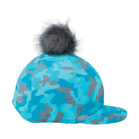 Turquoise and gray camouflage equestrian dynaforce hat cover with fluffy dark gray pom-pom for winter use