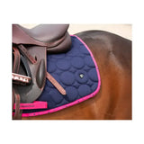Navy blue quilted hy equestrian dynamizs ecliptic close contact saddle pad with pink trim and subtle dot pattern