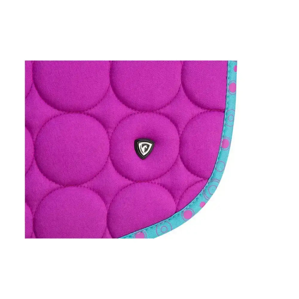 Vibrant magenta quilted equestrian dynamizs ecliptic close contact saddle pad with teal patterned border and black logo