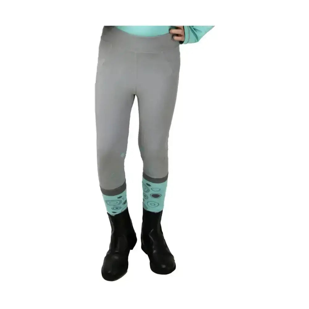 Gray dynamizs ecliptic riding tights with mint green patterned cuff perfect for equestrian use