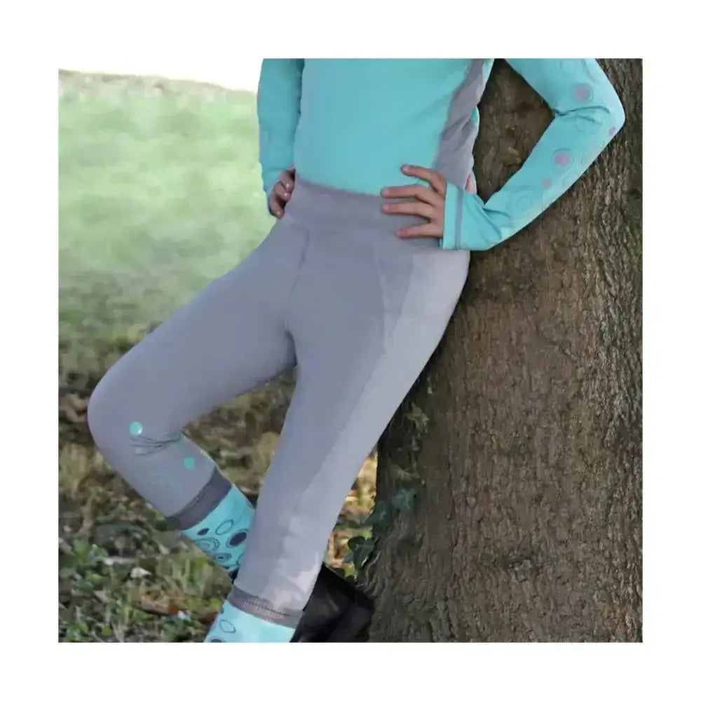 Gray hy equestrian dynamizs ecliptic riding tights with light blue accents and subtle circular patterns