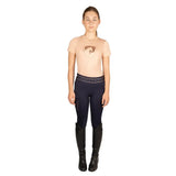 Navy blue athletic leggings with black branded waistband by elevate complement the equestrian elevate mizs t-shirt look
