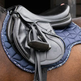 Black leather english saddle with navy blue quilted hy equestrian elevate allure saddle pad with white speckles