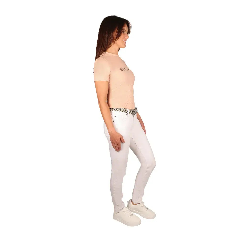 White denim jeans with black and white patterned belt paired with equestrian elevate allure t-shirt look