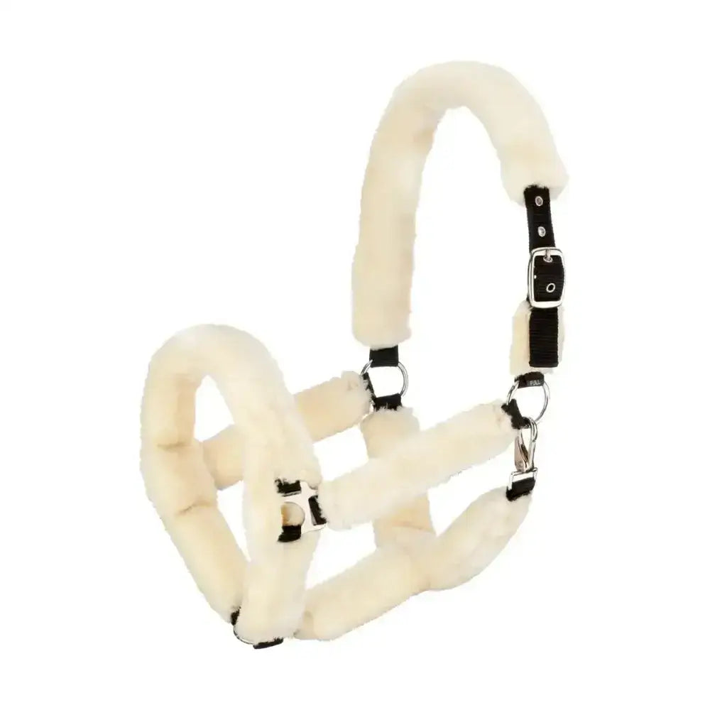Cream-colored sheepskin fab fleece headcollar with black leather straps and silver hardware by hy equestrian