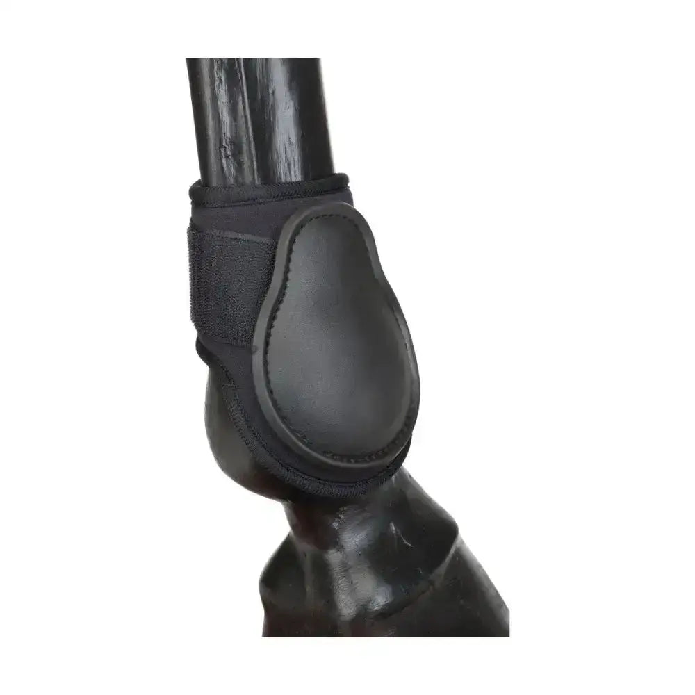 Black hy equestrian fetlock boots with padded contoured design and adjustable strap for ankle protection