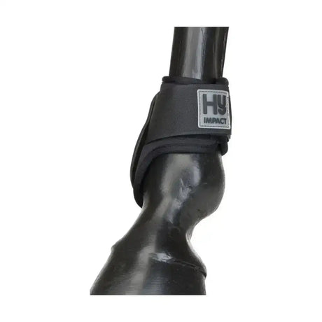 Black hy impact equestrian fetlock boots with sleek padded design and durable strap for ultimate protection