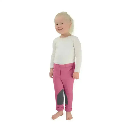 Pink Hy Equestrian fleece tots jodhpurs with dark gray knee patches and rolled cuffs practical fleece jodhpurs
