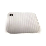 White quilted foam leg pads with vertical stitching and a black label offer extra protection for equestrian use