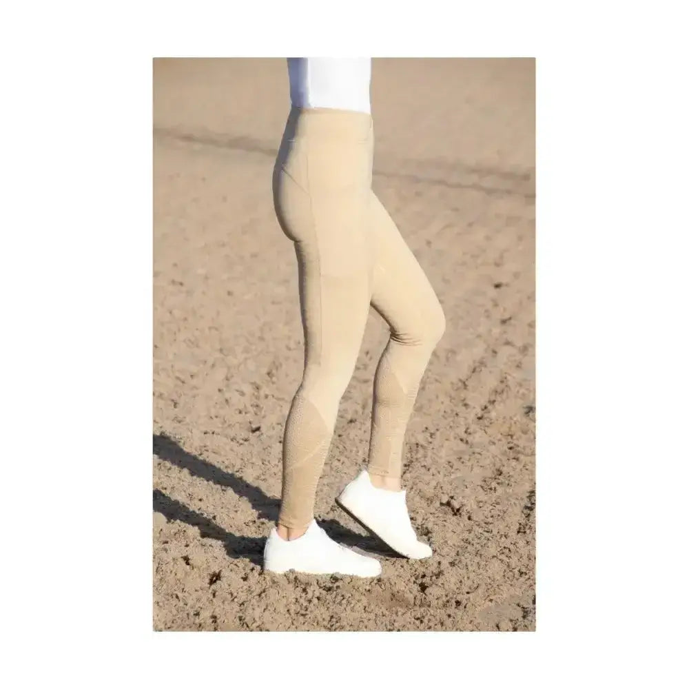 Beige high-waisted fordwich riding tights with smooth form-fitting design and four-way stretch fabric for equestrian use