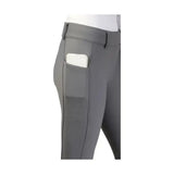 Gray equestrian glacial softshell riding tights with sleek fit and side pocket holding a white smartphone