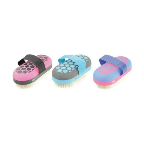 Three colorful hy equestrian glitter body brushes with soft goat hair bristles and hexagonal patterns in pink gray blue designs