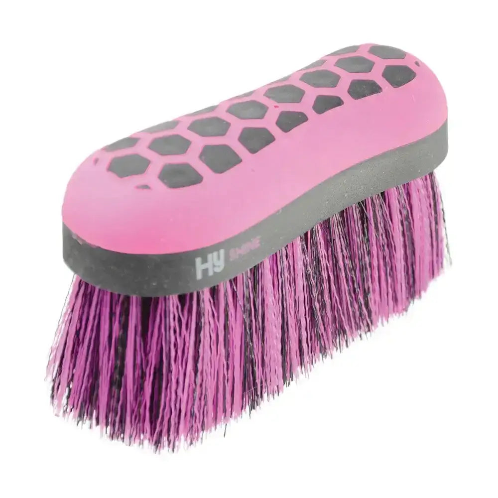 Pink and gray equestrian glitter dandy flick brush with hexagonal grip and multicolored bristles for grooming horses
