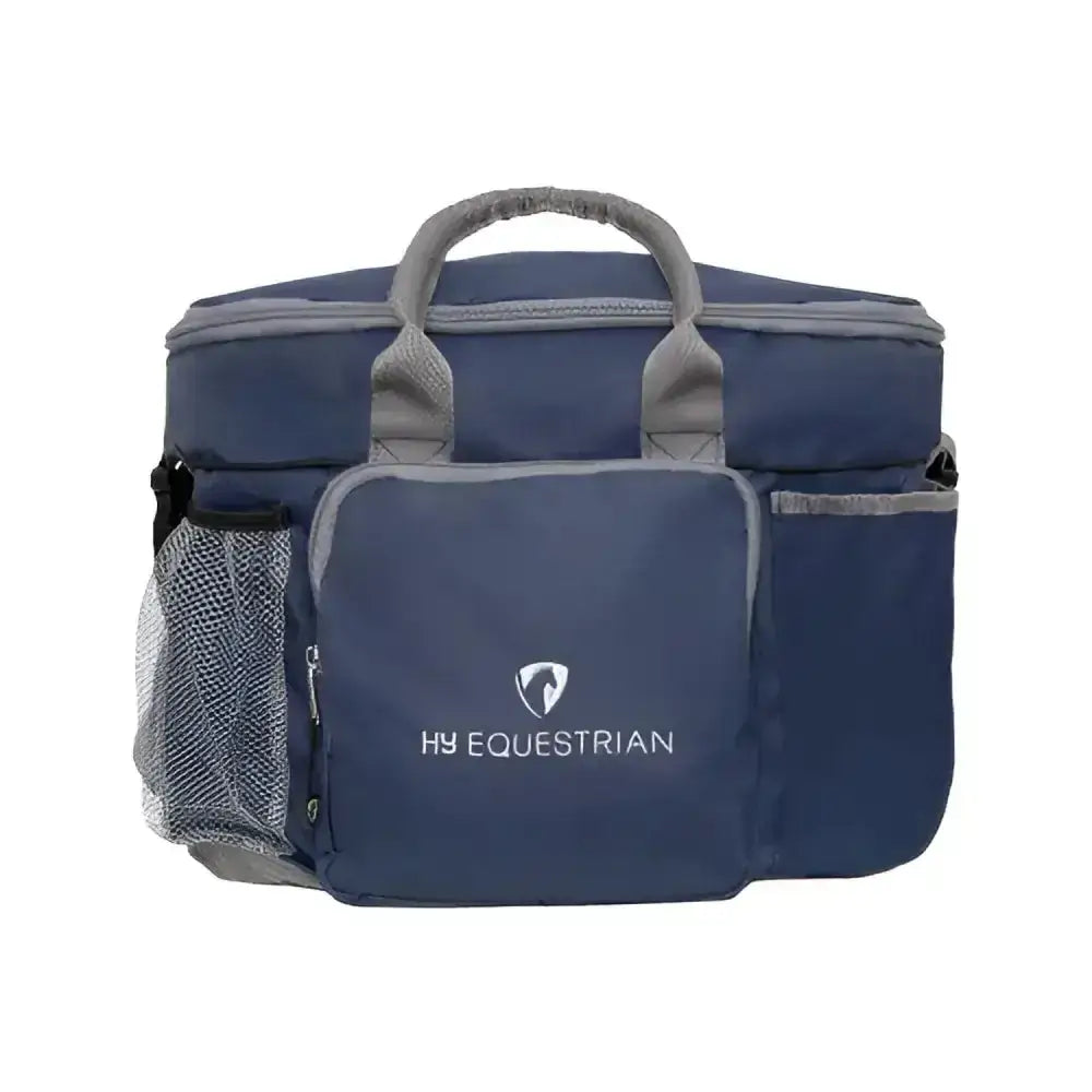 Navy blue hy equestrian grooming bag with gray handles, mesh side pocket, and six open pockets for grooming essentials neat