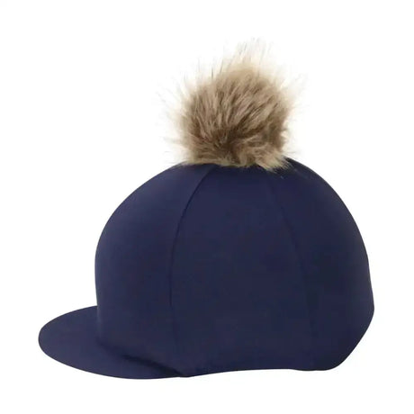 Navy blue hy equestrian hat cover with tan faux fur pom pom made of stretchy lycra hat material