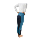Teal and navy blue HY EQUESTRIAN hyEDITION full seat breeches with padded knee sections for riding breeches use