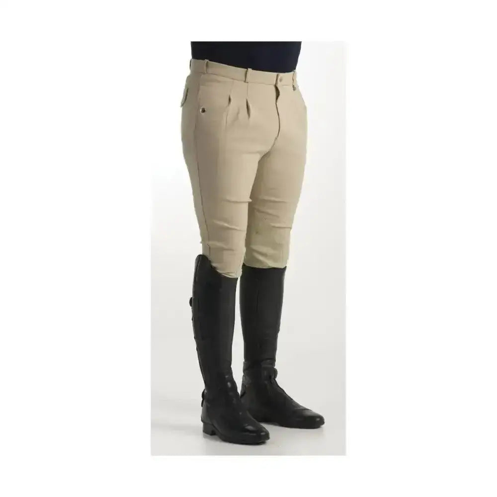 Beige equestrian jakata men’s breeches with tailored fit pleated front and stretch leather knee paired with black boots