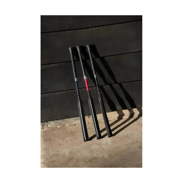 Three black hy equestrian legal jump bats with textured grips and colored accents for competitive jumping use