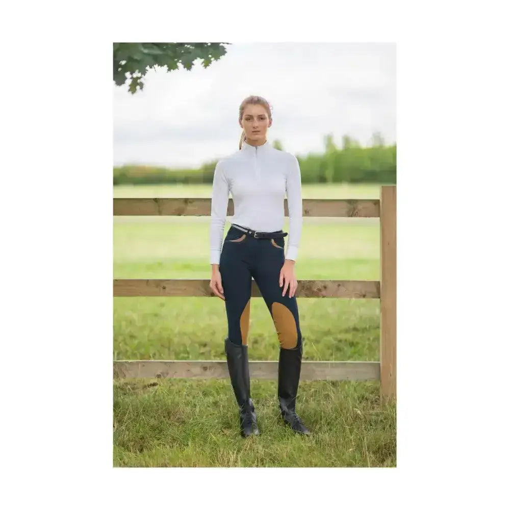 Black equestrian malvern ladies breeches with tan knee patches and a breathable 4-way stretch fabric and black belt