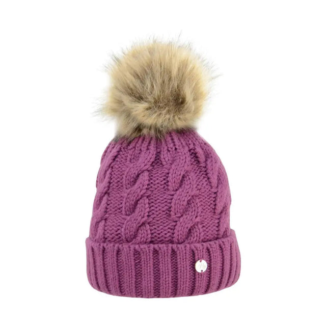 A cozy purple hy equestrian melrose cable knit bobble hat with a fluffy beige pom pom and silver button cuff