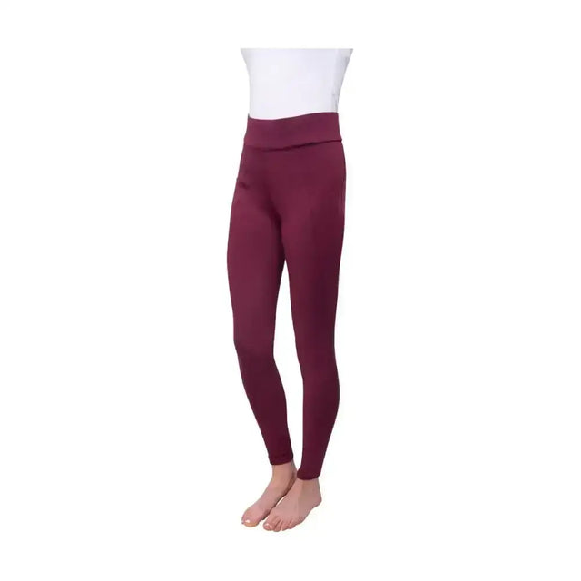 Maroon hy equestrian melton ladies riding tights made of stretchy fabric shown on a model wearing a white top