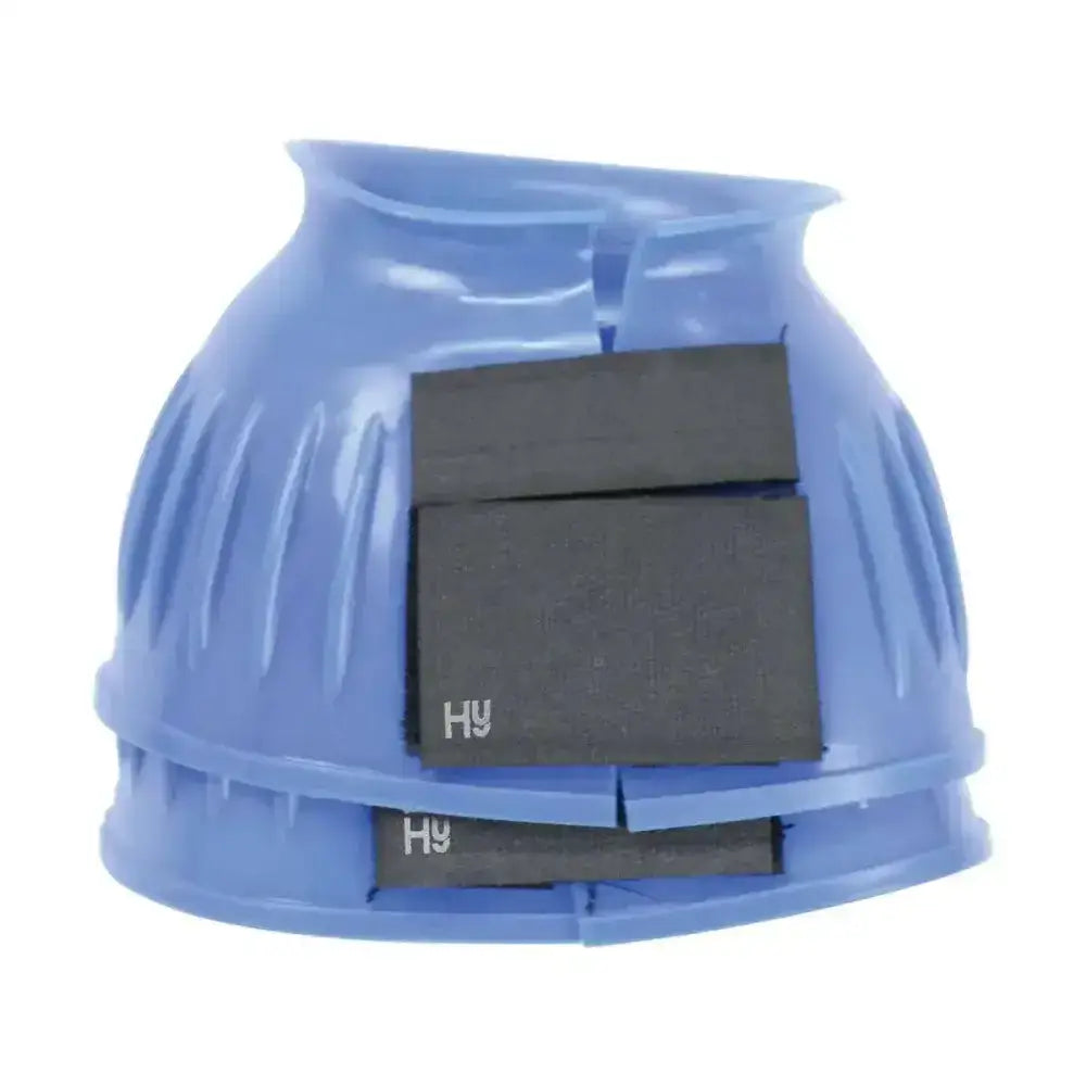 Blue plastic hy equestrian over reach boots with three black magnetic inserts for horses hoof protection