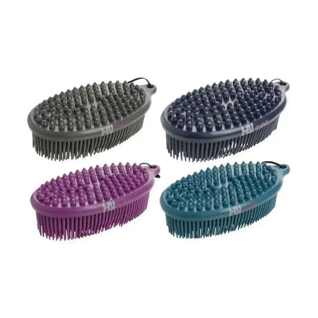 Four oval-shaped multi-colored equestrian pebble brushes with dense bristles and handle loops to effectively remove dirt
