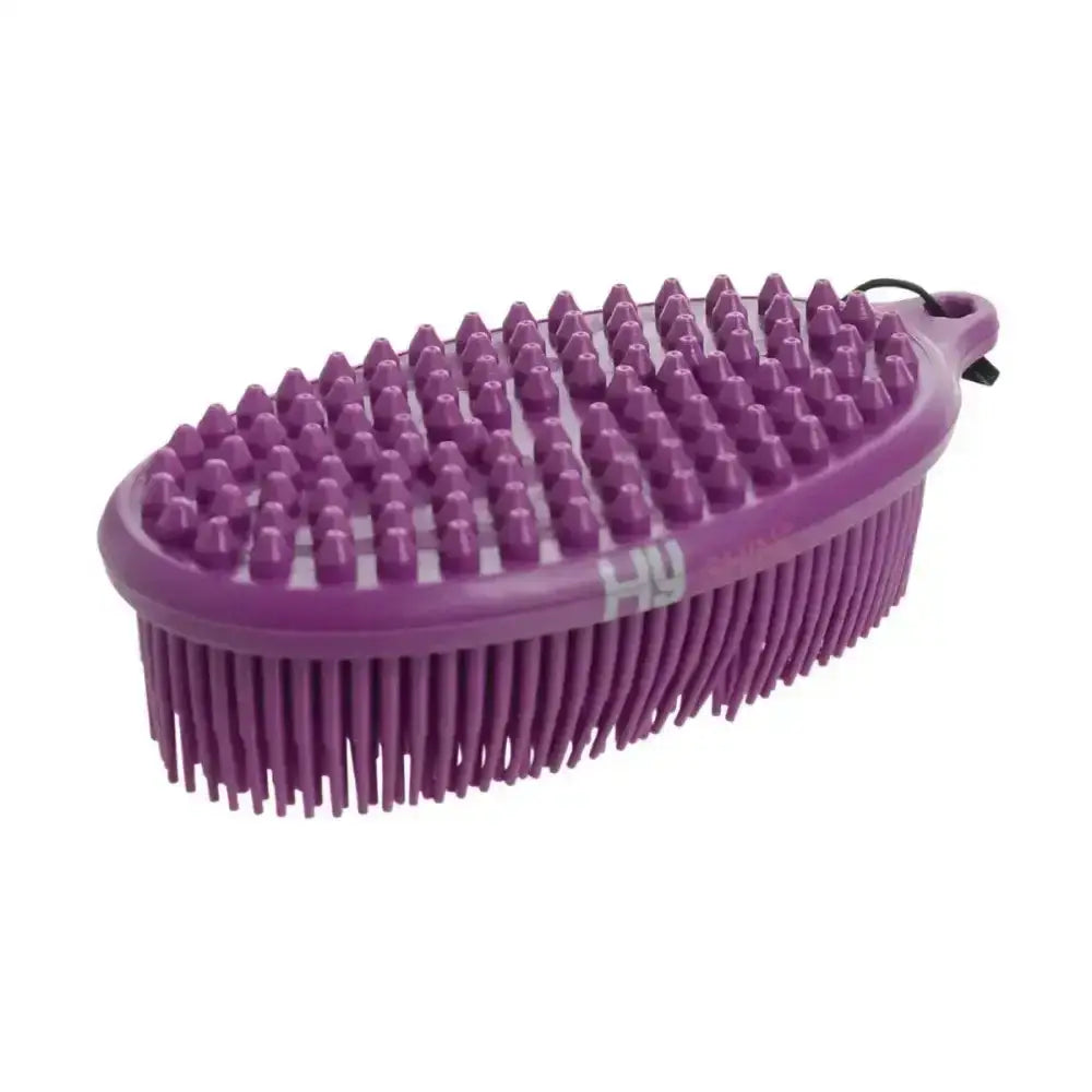Purple oval-shaped hy equestrian pebble brush with raised nubs and bristles two-in-one grooming tool to effectively remove dirt