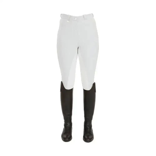 White equestrian pro ladies breeches with black leather boots designed for competitive rider comfort and style