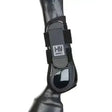 Black hy equestrian pro tendon boots with glossy finish and adjustable velcro straps for quality performance boots