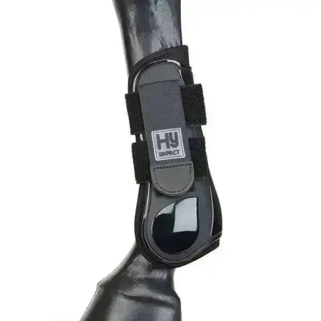 Black hy equestrian pro tendon boots with glossy finish and adjustable velcro straps for quality performance boots