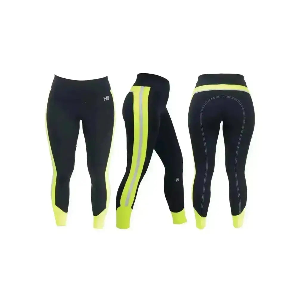 Black helly hansen riding leggings with neon yellow accents and reflective stripes perfect reflector ladies breeches