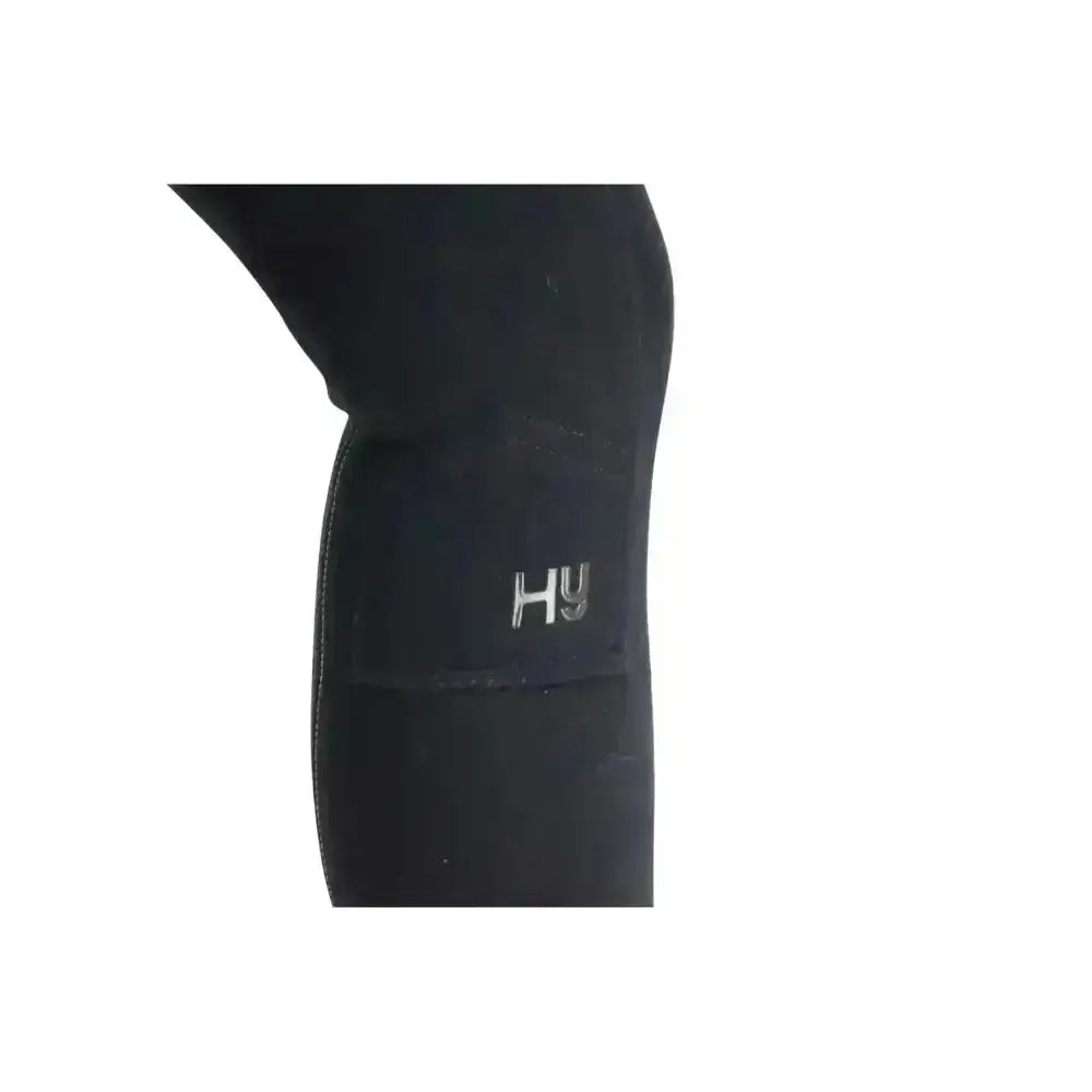 Close-up of black neoprene reflector ladies breeches leg with silver hy logo patch stylish pull-on hyviz design
