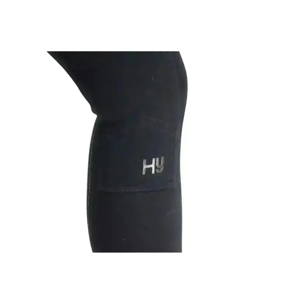Black neoprene wetsuit leg with silver hy logo patch on stylish pull-on hyviz reflector ladies breeches for equestrian use