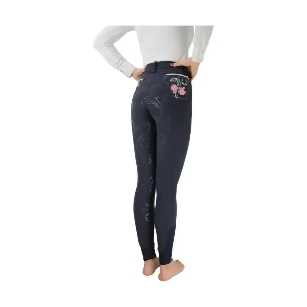 Back view of dark navy hy equestrian regatta ladies breeches featuring exquisite pink and silver floral embroidery on pocket