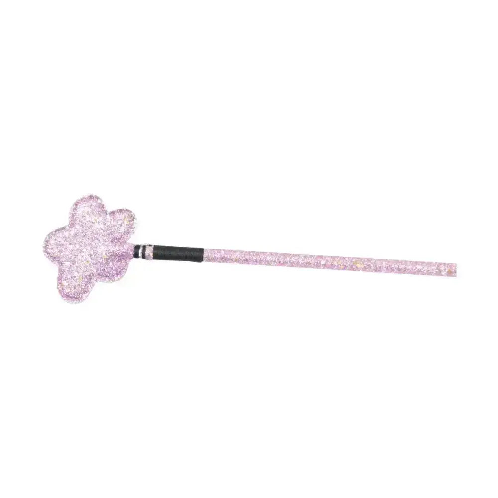 Pink glittery flower shaped riding whip topper with sparkling texture and black grip band for equestrian riding whip