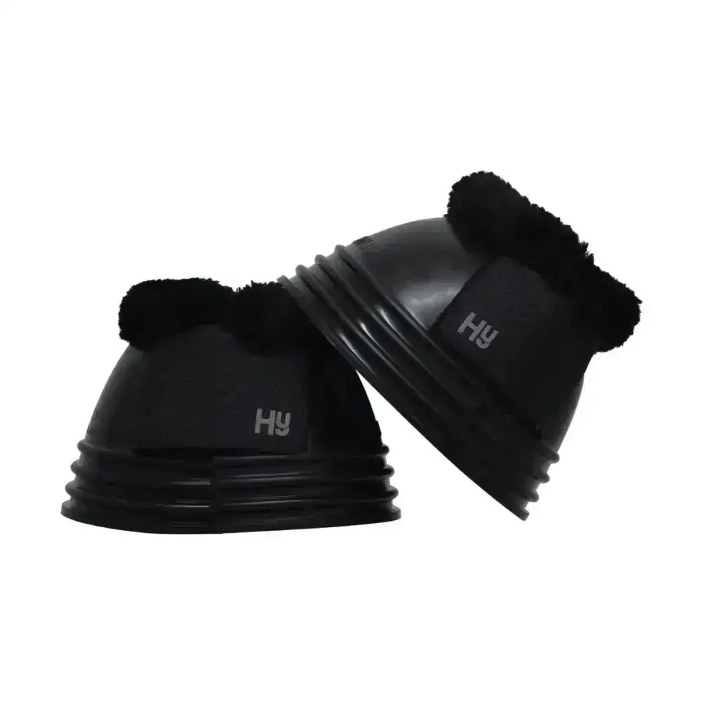 Black horse hoof boots with plush black hyimpact fleece topped lining and sleek ribbed design for equestrian use