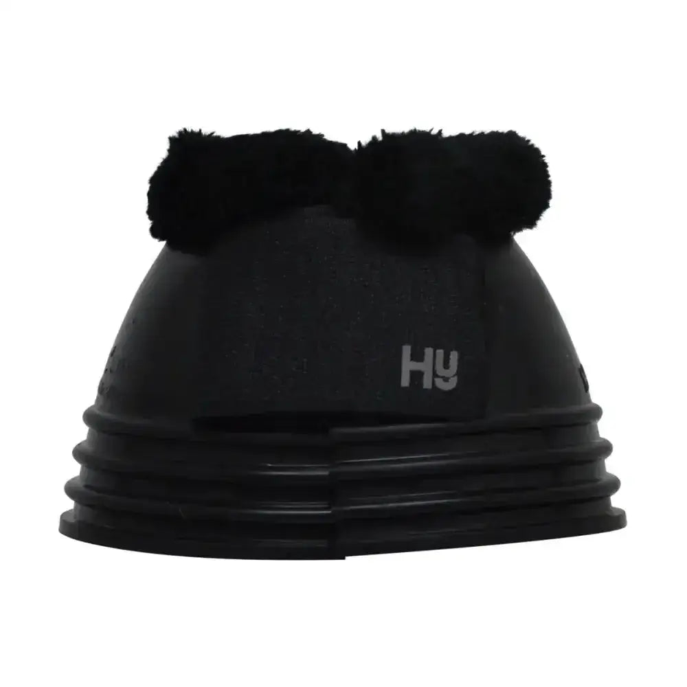 Black plastic hy equestrian ringed fleece topped over reach boot with fuzzy pom-poms on top