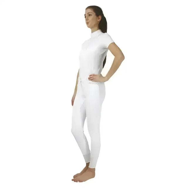 White athletic compression suit with short sleeves and high neckline in equestrian roka rose breeches style