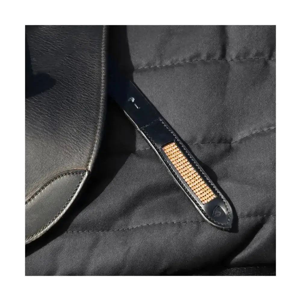 Black leather strap with woven gold accent on rosciano rose gold stirrup leather from hy equestrian