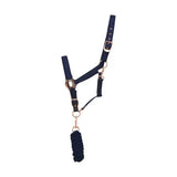 Navy blue horse halter with rose gold head collar hardware and matching braided lead rope for equestrian rose gold style