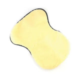 Soft yellow sheepskin equestrian seat saver with black stitched border for saddle covers and seat savers